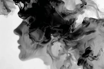 Ethereal Swirls: The Dance of Liquid Ink and Milky Water