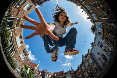 Ultra-Wide Fisheye Urban Sky Perspective Shot