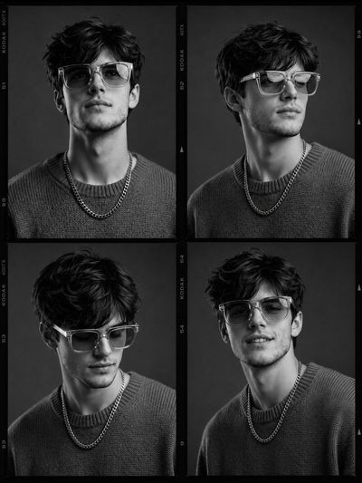 A model with curly hair shows four expressions in monochrome portraits