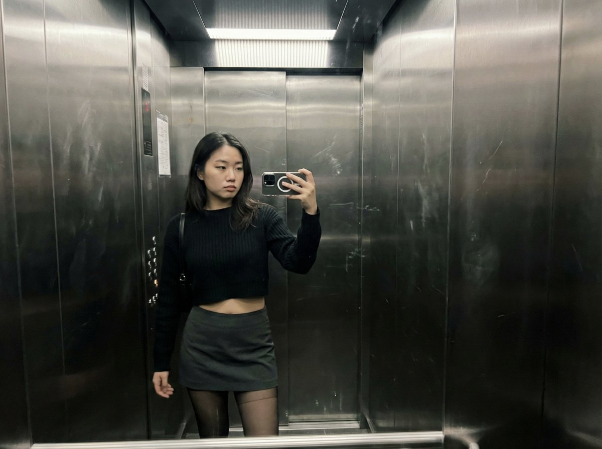The Unseen Side of Glamour: A Late Night Elevator Moment