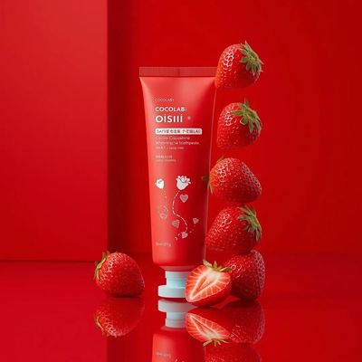 Glossy Red Perfection: Strawberry-Infused Toothpaste Ad