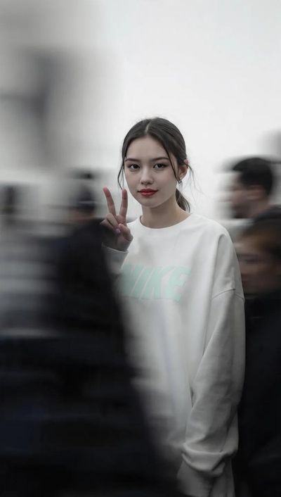 Poised Stillness Amid Urban Motion in High-Fashion Portrait
