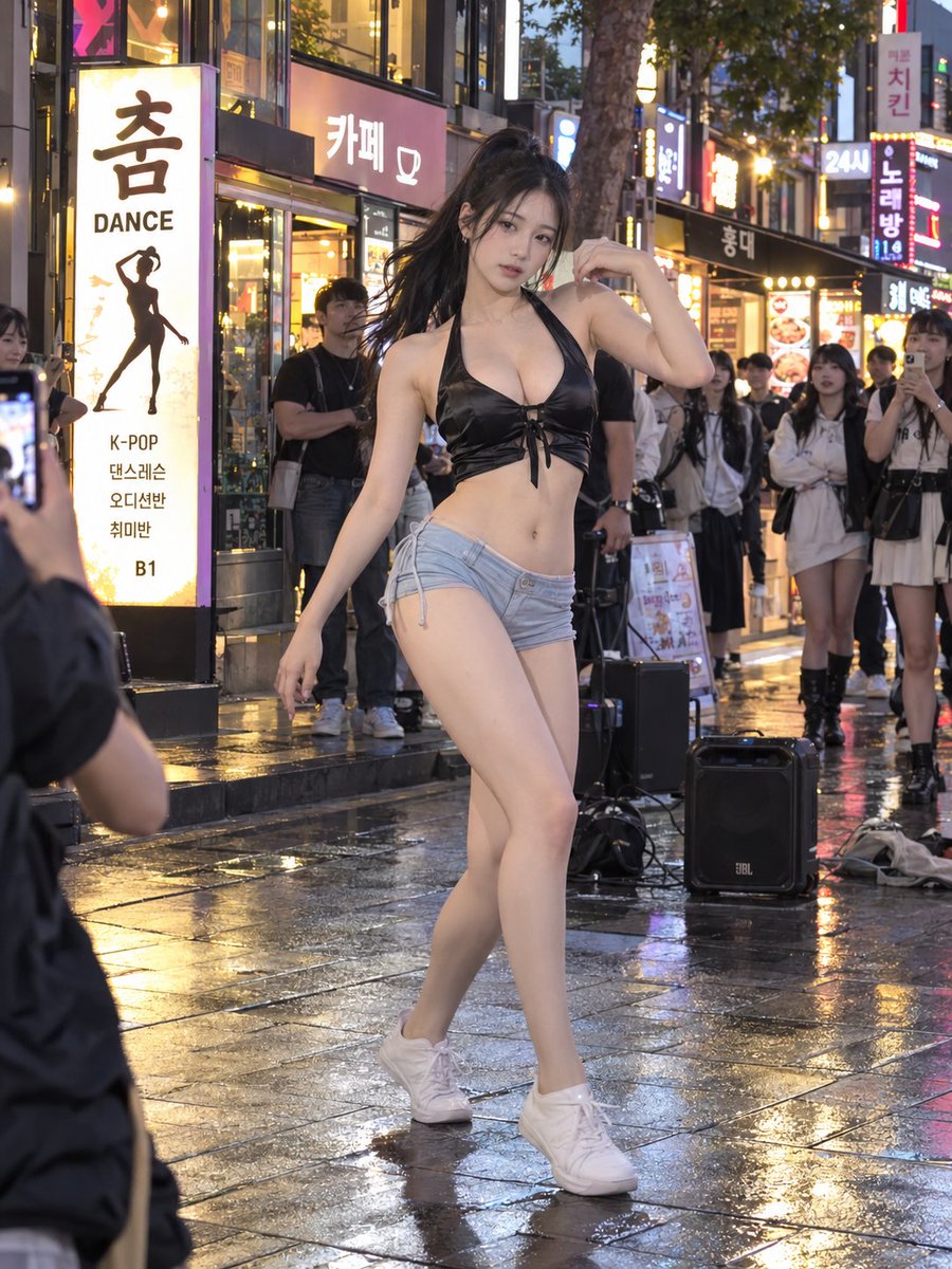 Korean Street Dancer Pauses Under Warm Neon Cafe Signs