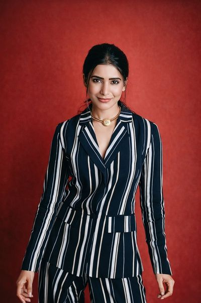 Red Radiance: A Confident Portrait Unveiled