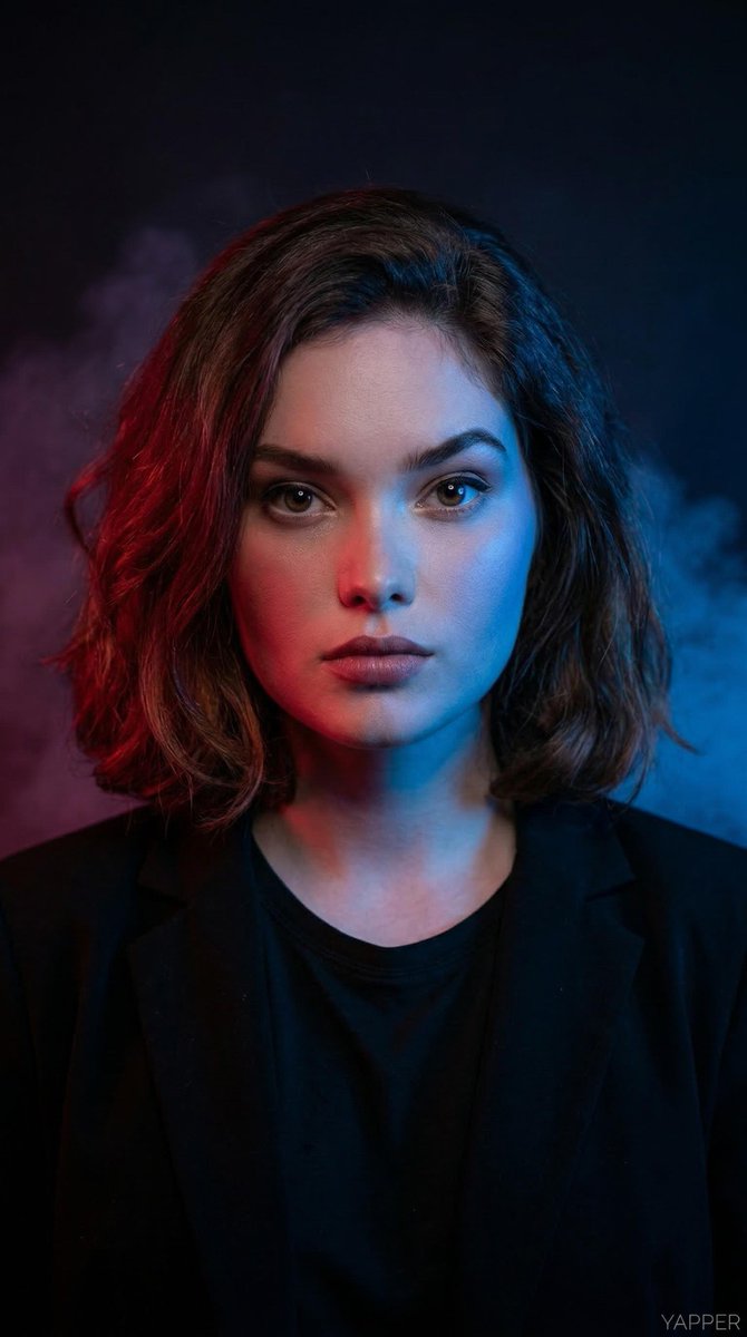 Electric Haze: Dark Studio Portrait with Vibrant Glow