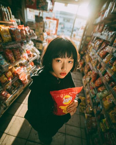 Golden Hour in Aisle: Candid Store Moment