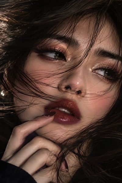 Intense Gaze and Burgundy Lips Define This Cinematic Beauty Portrait
