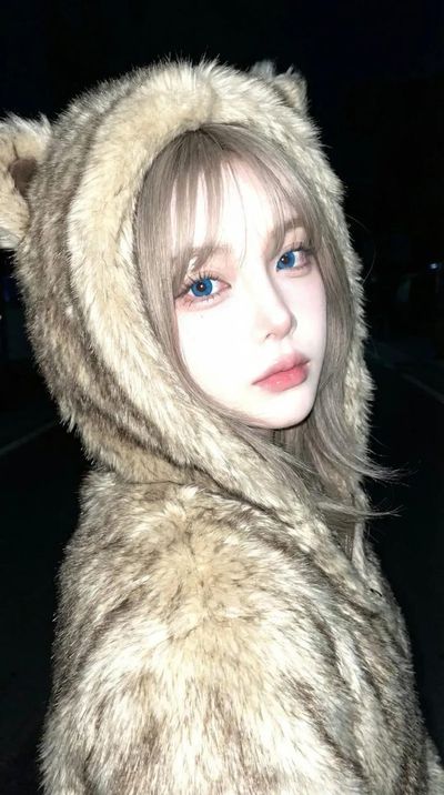 Raw Night Flash Portrait with Animal Hood