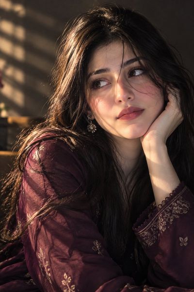 Golden Hour Light Caresses a Pensive Woman in Plum Kurta