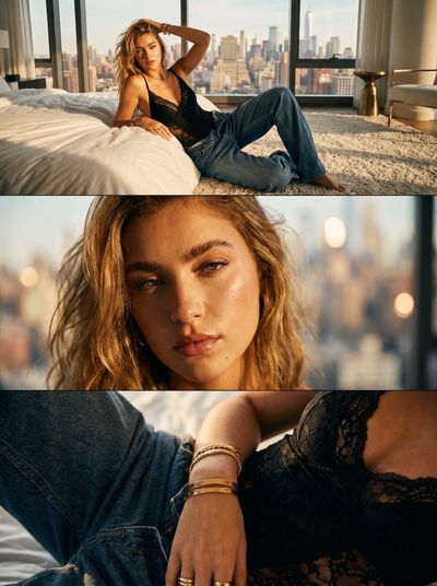 Elena lounges in Soho penthouse wearing lace bodysuit and vintage denim