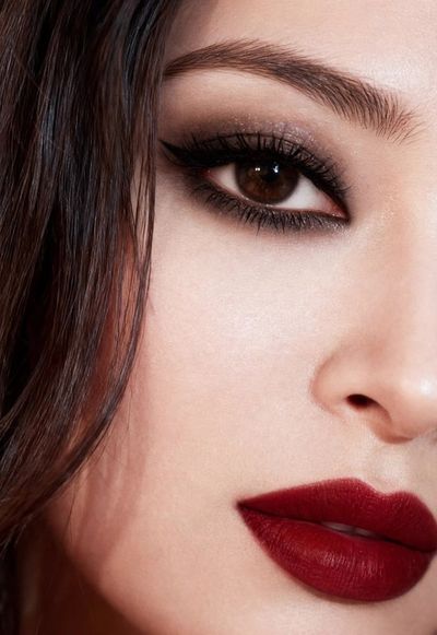 Crimson Lips and Smoky Eyes Define This High-Fashion Beauty Portrait