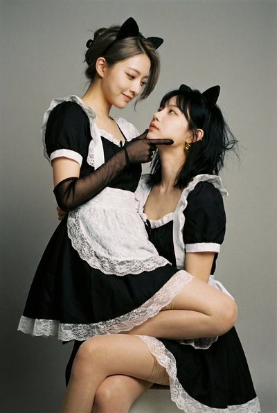 Contrasting Smiles: The Maid Duo