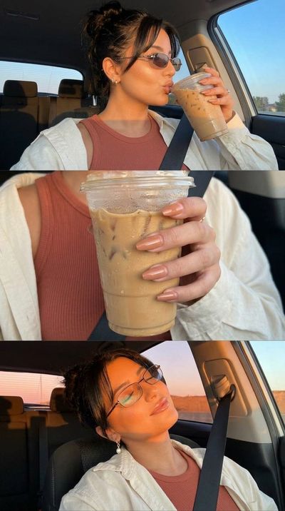 Model takes a sunset latte break in a luxury car selfie