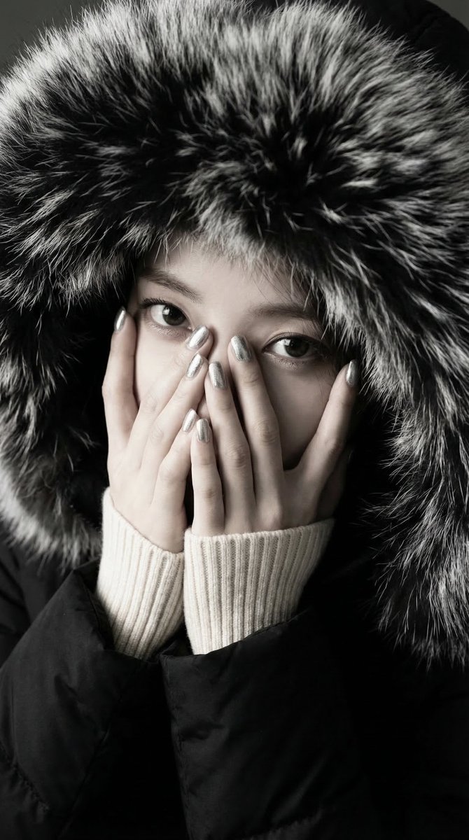 Doe-Eyed Winter Gaze Above the Fur Cocoon