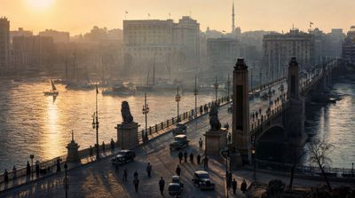 Golden morning mist embraces Cairo's Qasr El Nil Bridge in 1940