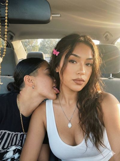 Playful Sunlit Car Selfie with a Twist