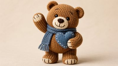 Charming Handcrafted Toy: Knitted Yarn Creature in Soft Lighting