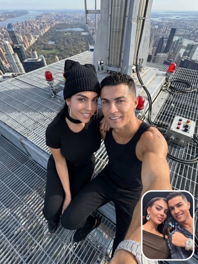 Couple shares a rooftop selfie with Central Park in background