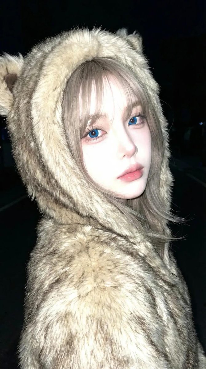 Raw Night Flash Portrait with Animal Hood