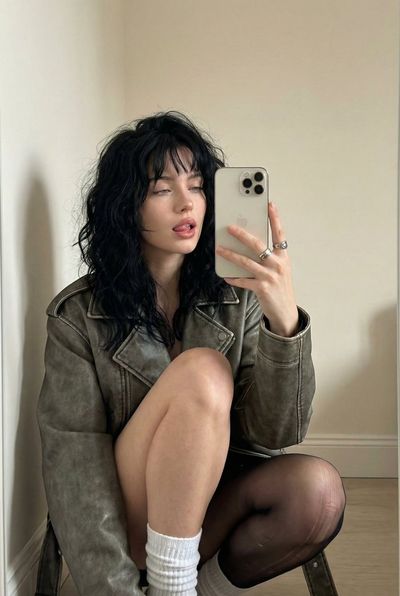 Moody Reflections: A Candid Mirror Moment