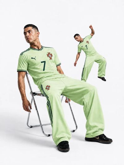 Cristiano Ronaldo sits casually on a chrome folding chair