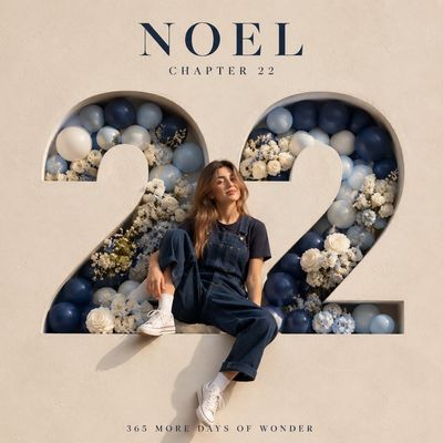 A happy child sits on carved number 22 in luxury poster