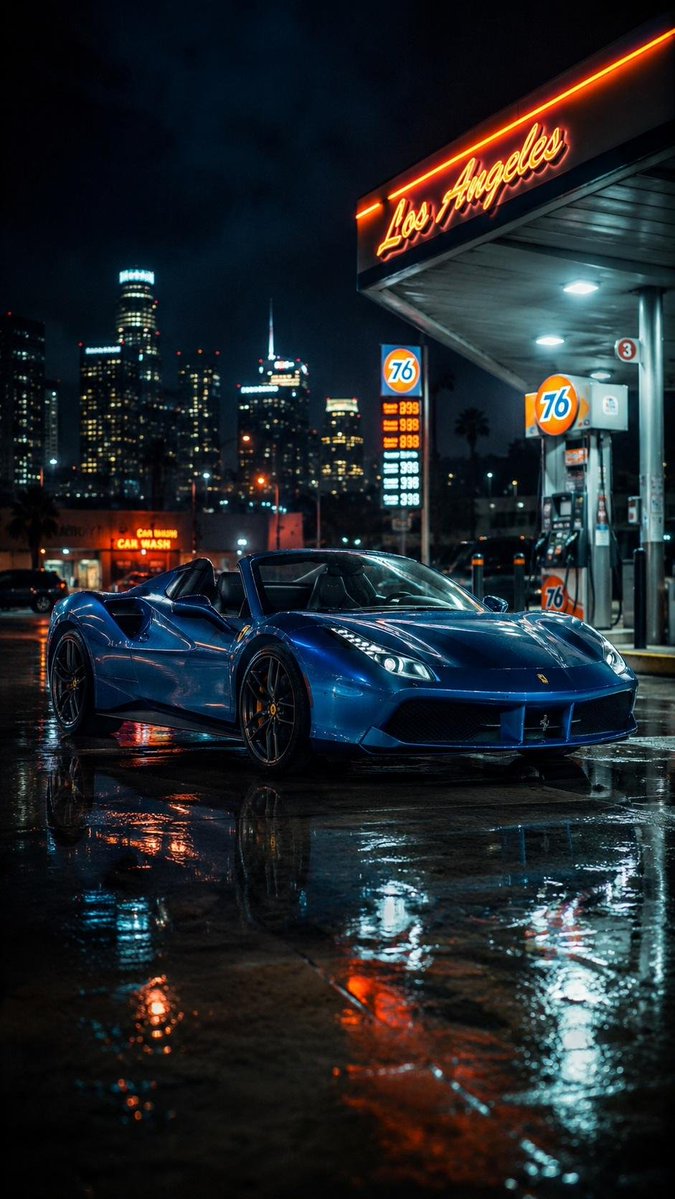 A sleek black Monte Carlo reflects on wet pavement at dusk