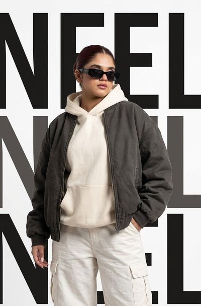 Bold typography frames a model in oversized Korean streetwear