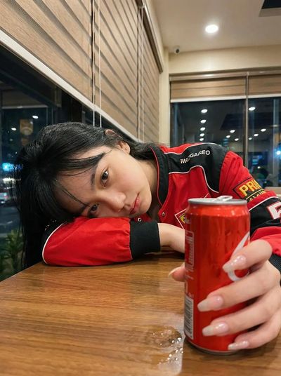 Intimate Night Portrait at a Cozy Café