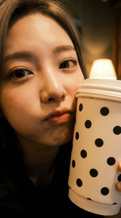 Intimate Portrait of Playfulness with a Giant Cup