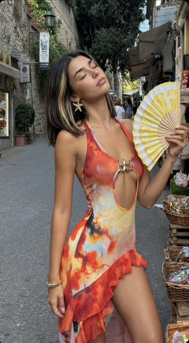 Sunlit Elegance: Mediterranean Mini Dress and Golden Accessories