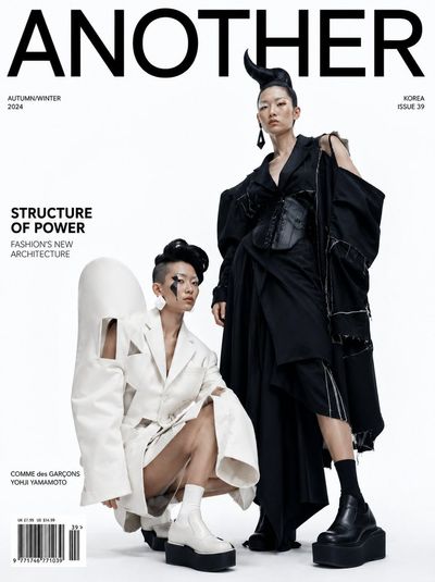 Korean models wear avant-garde blazers in clinical studio light