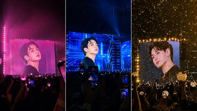 A K-pop idol appears on giant LED screens in a packed arena