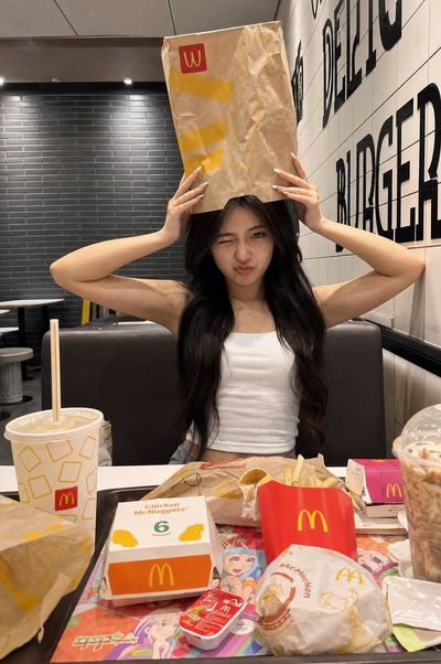 Playful Fast-Food Moment in iPhone Realism
