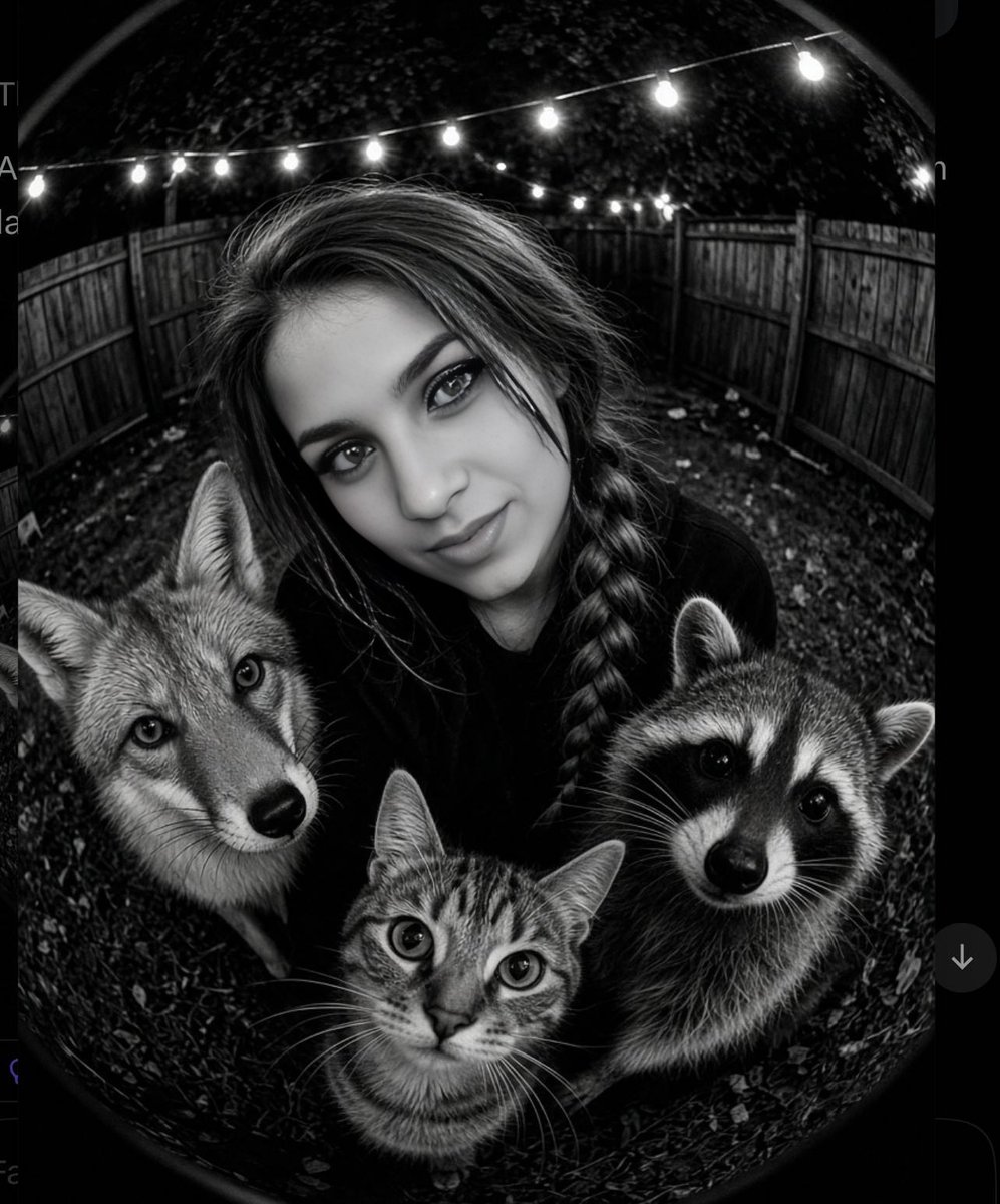 Woman and wild animals gather under fairy lights at night