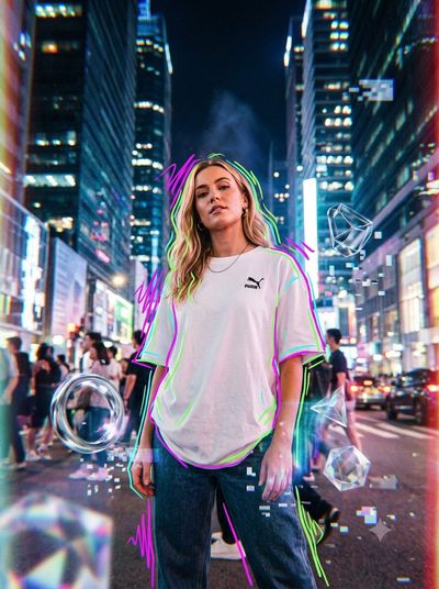 Neon scribbles outline a confident woman in a cyberpunk city