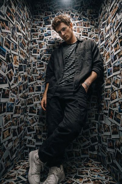 Silent Stories in a Wall of Polaroids