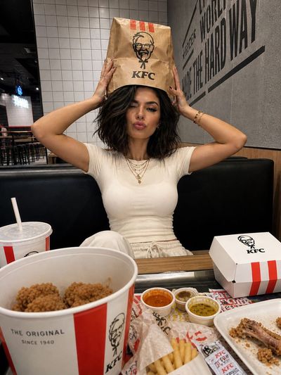 Playful Moment in a Fast-Food Booth