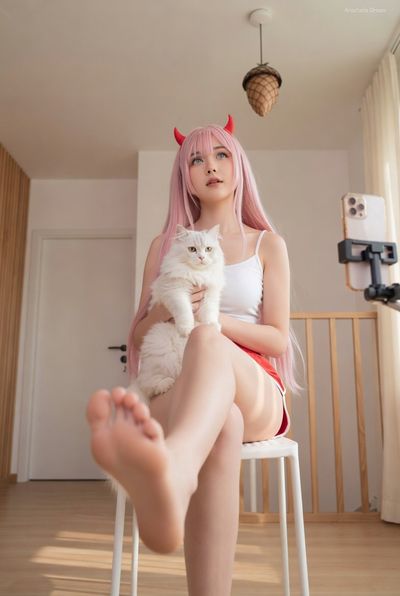 Pastel Devil Cosplayer with Fluffy Companion