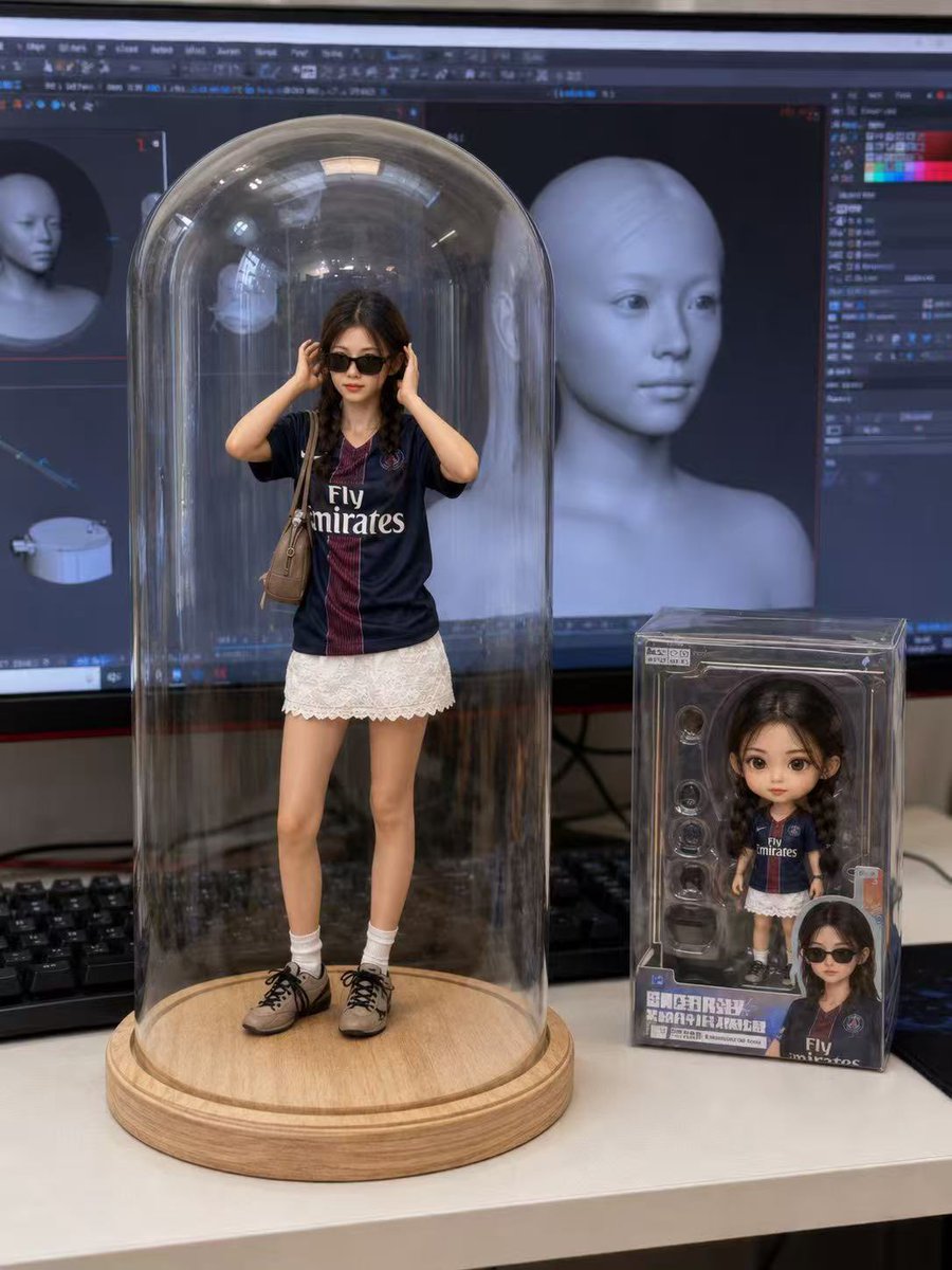 Realistic figurine stands in glass dome on a wooden desk