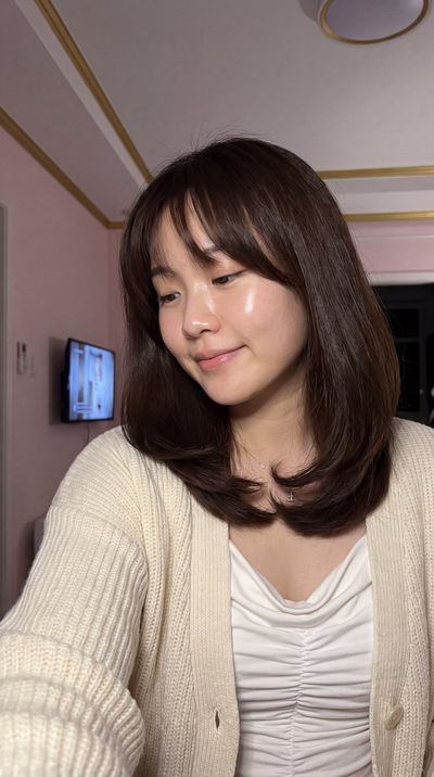 Radiant Glass Skin Selfie Glows Under Soft Nighttime Indoor Lighting