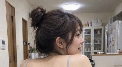 Capturing Everyday Moments: A Young Woman in a Cozy Dining Scene