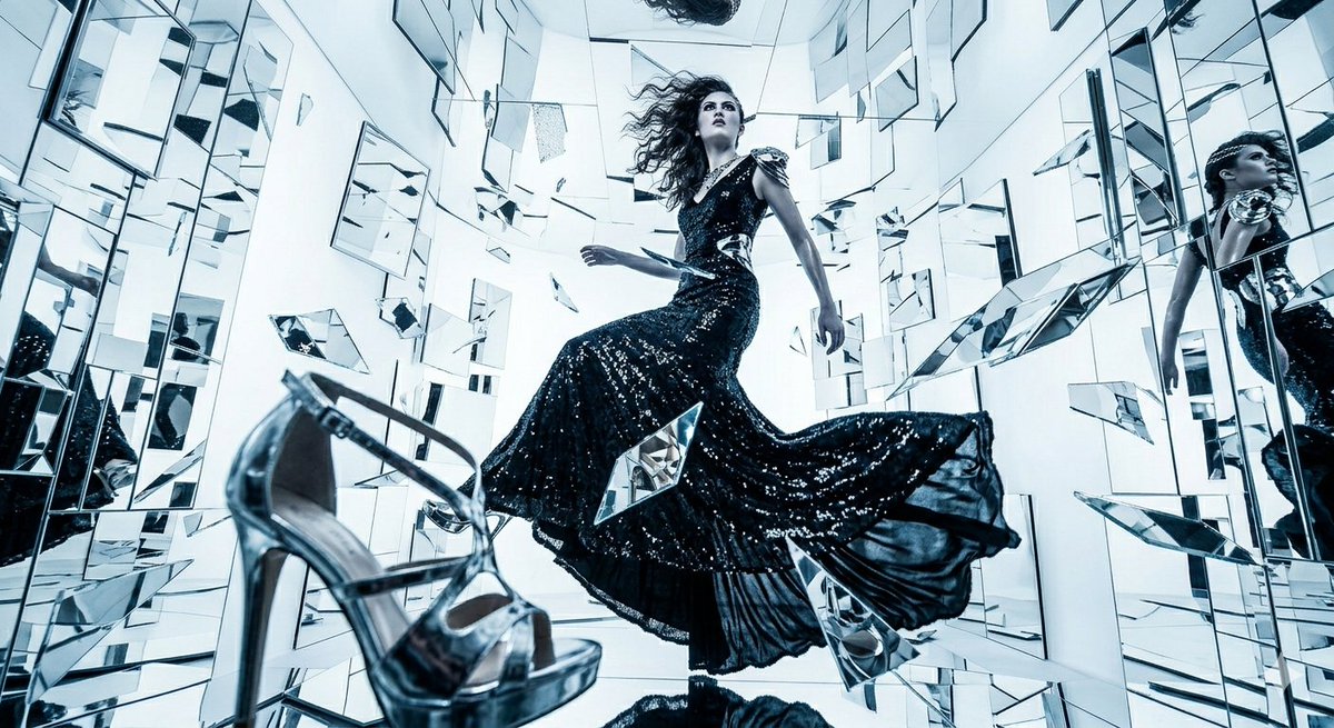 Kaleidoscopic Elegance: Sequined Gown in a Mirror Maze