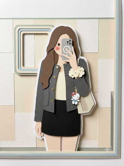 A cute papercraft bunny sits in a layered pastel garden diorama