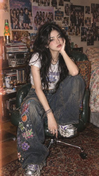 Y2K Dreamer Crouches on Green Chair in Messy Room