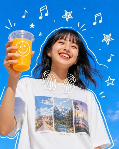 Cheerful Asian girl reaches for camera under bright blue sky