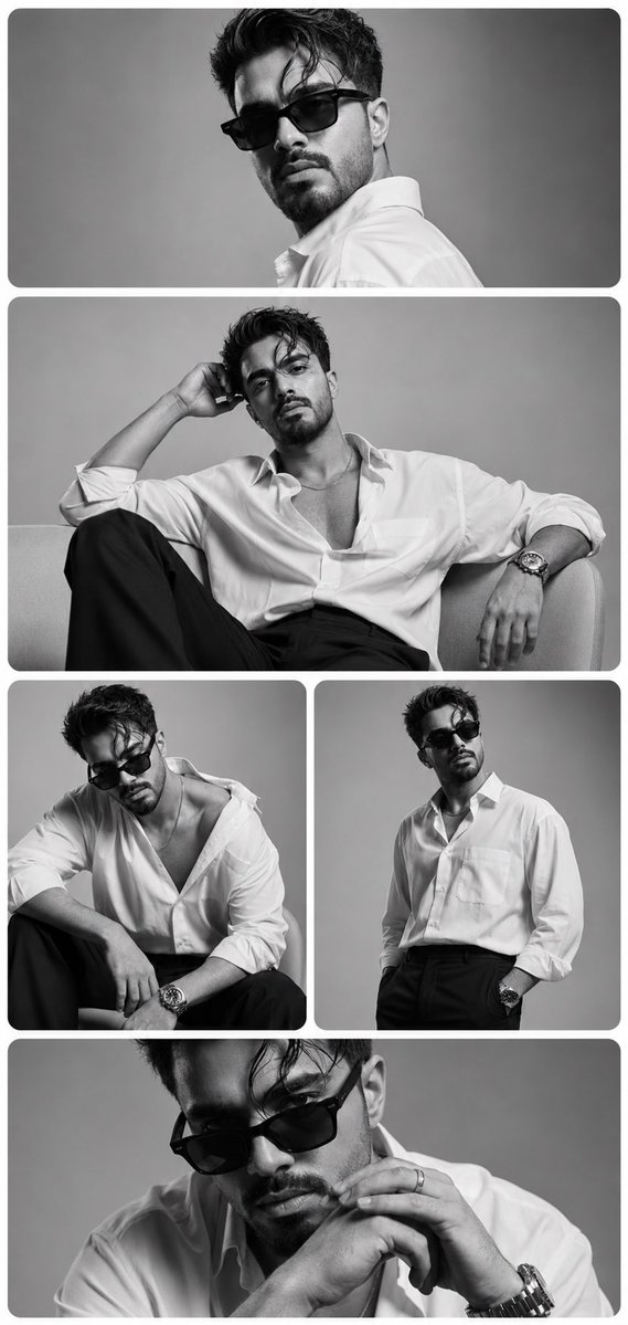 A man in black sunglasses poses for a luxury editorial portrait