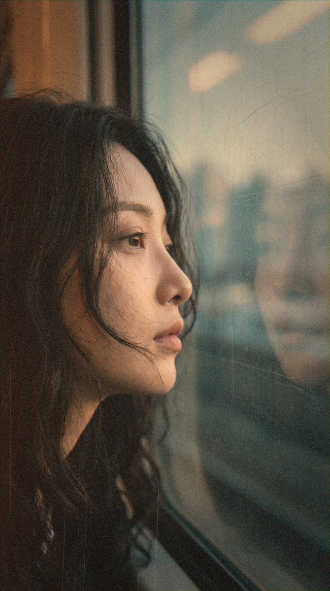 Cinematic Portrait of Reflection Beside a Train Window at Dawn