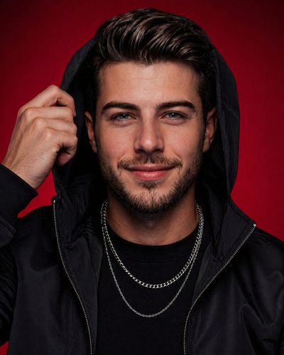 Ultra-Realistic Studio Portrait with Red Background Contrast