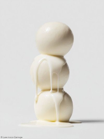 Macro stack of tomatoes, eggs, sweatshirt, and ice creams with liquid drips